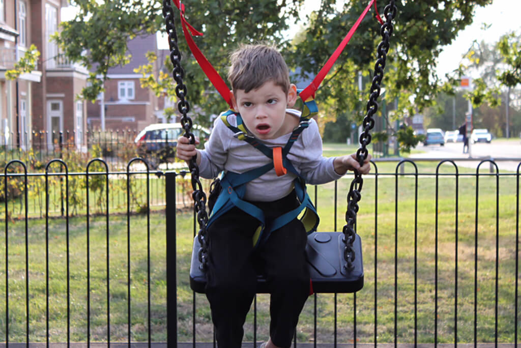 Owen swinging.