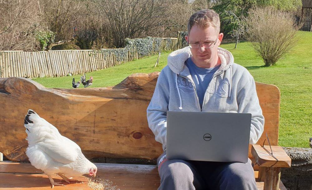 dr ross head works from home with his pet chickens