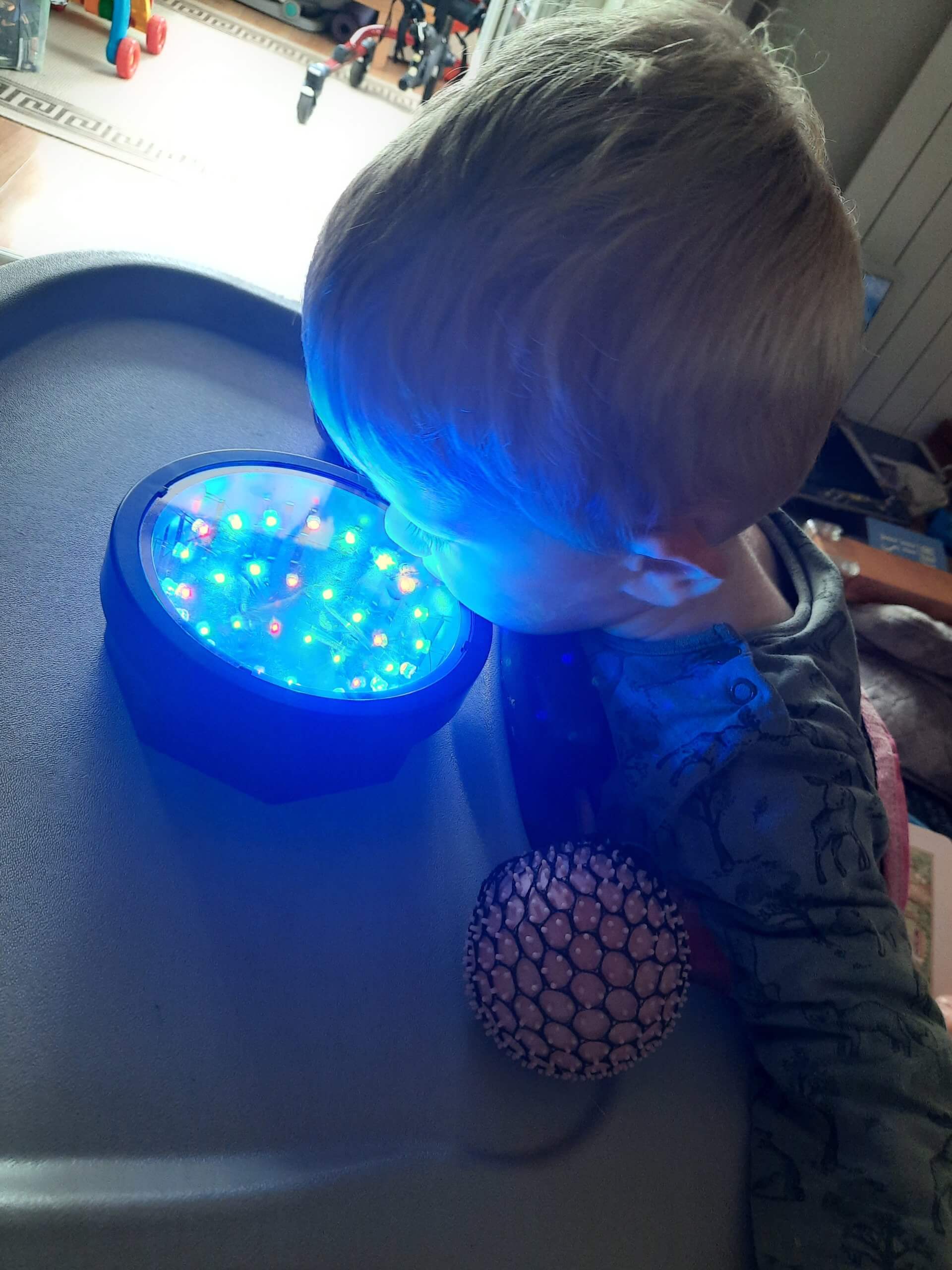 Child playing with sensory toys