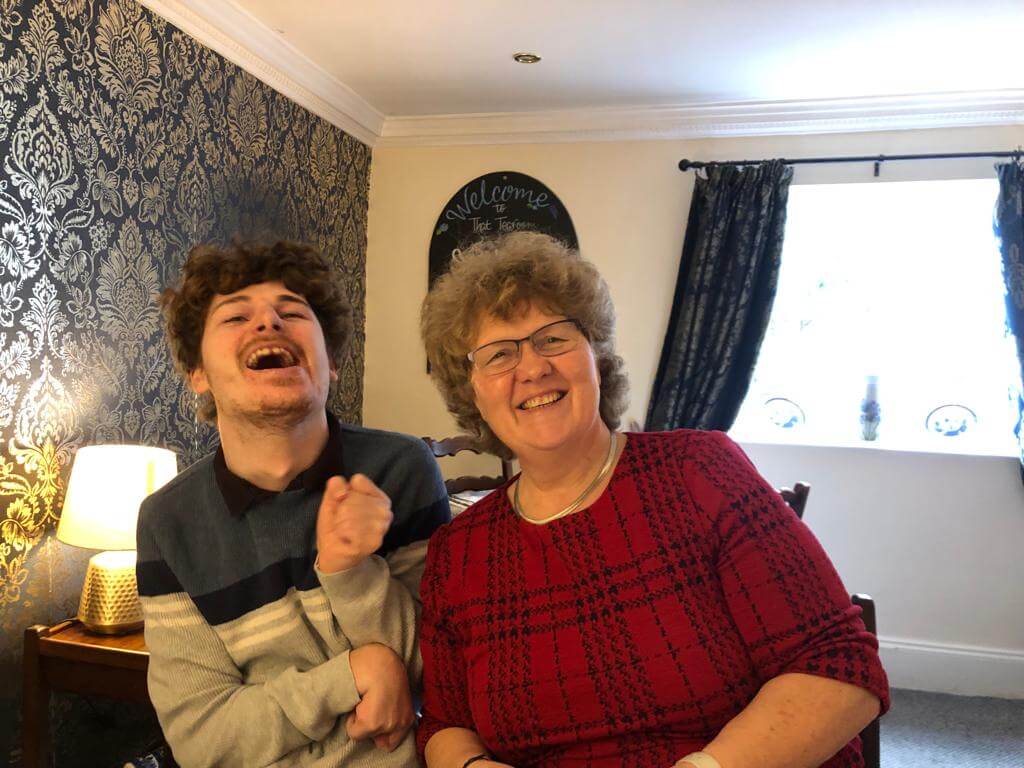 Image of Joshua and his mum laughing together