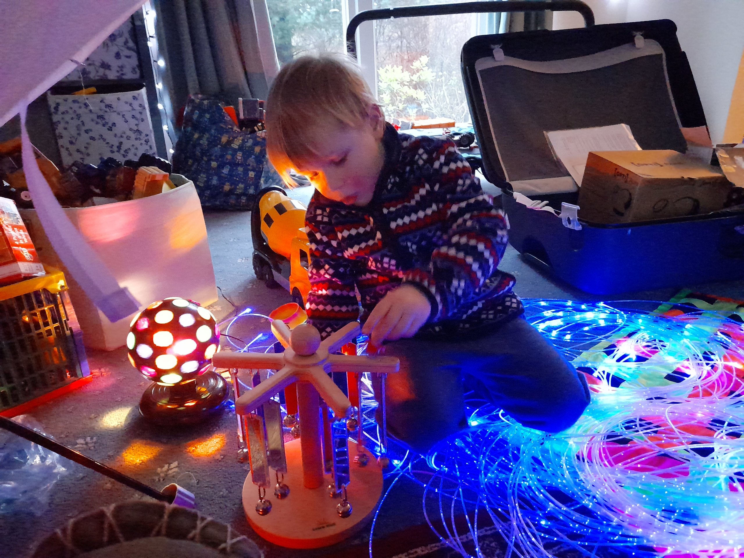 Joe playing with sensory toys