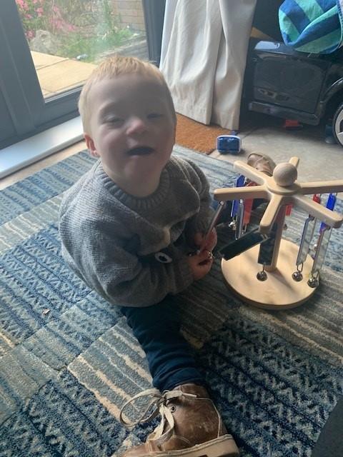 Elijah playing with a sensory toy