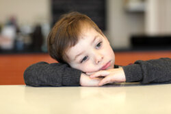 Little boy looking anxious.