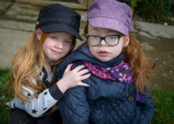 Two girls who have benefited from the work by Cerebra.