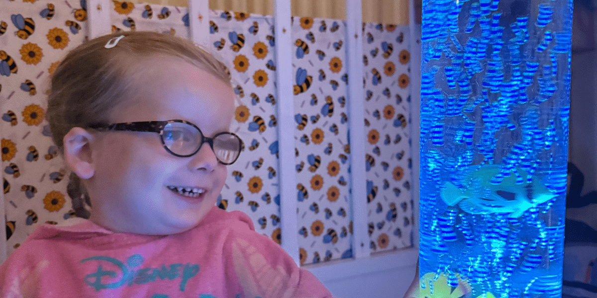 Dominique with fibre optic lamp - library