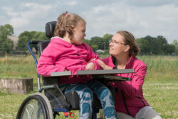 Mum with her daughter in a wheelchair